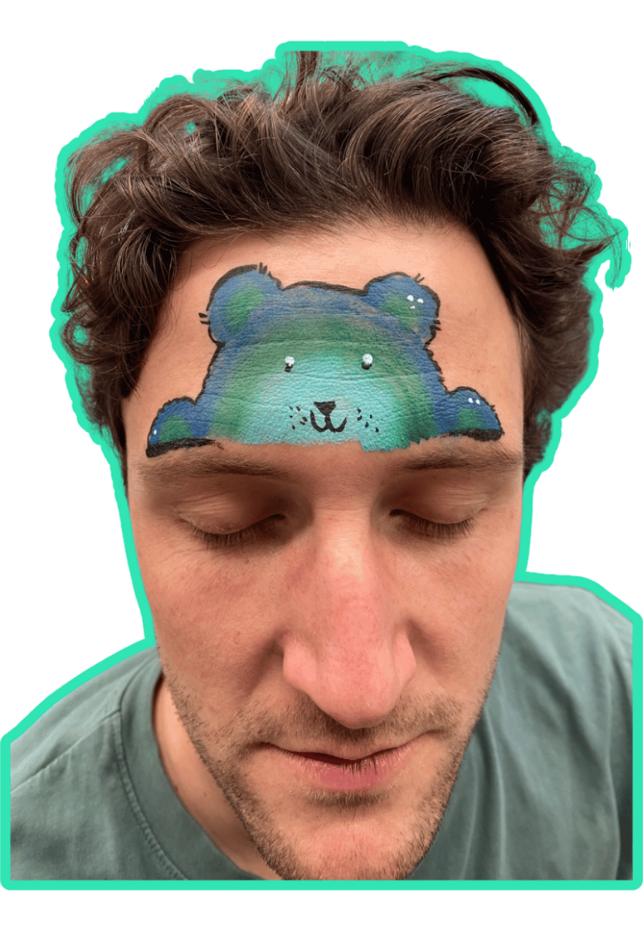 Man with a bear face paint on his forehead against a green background